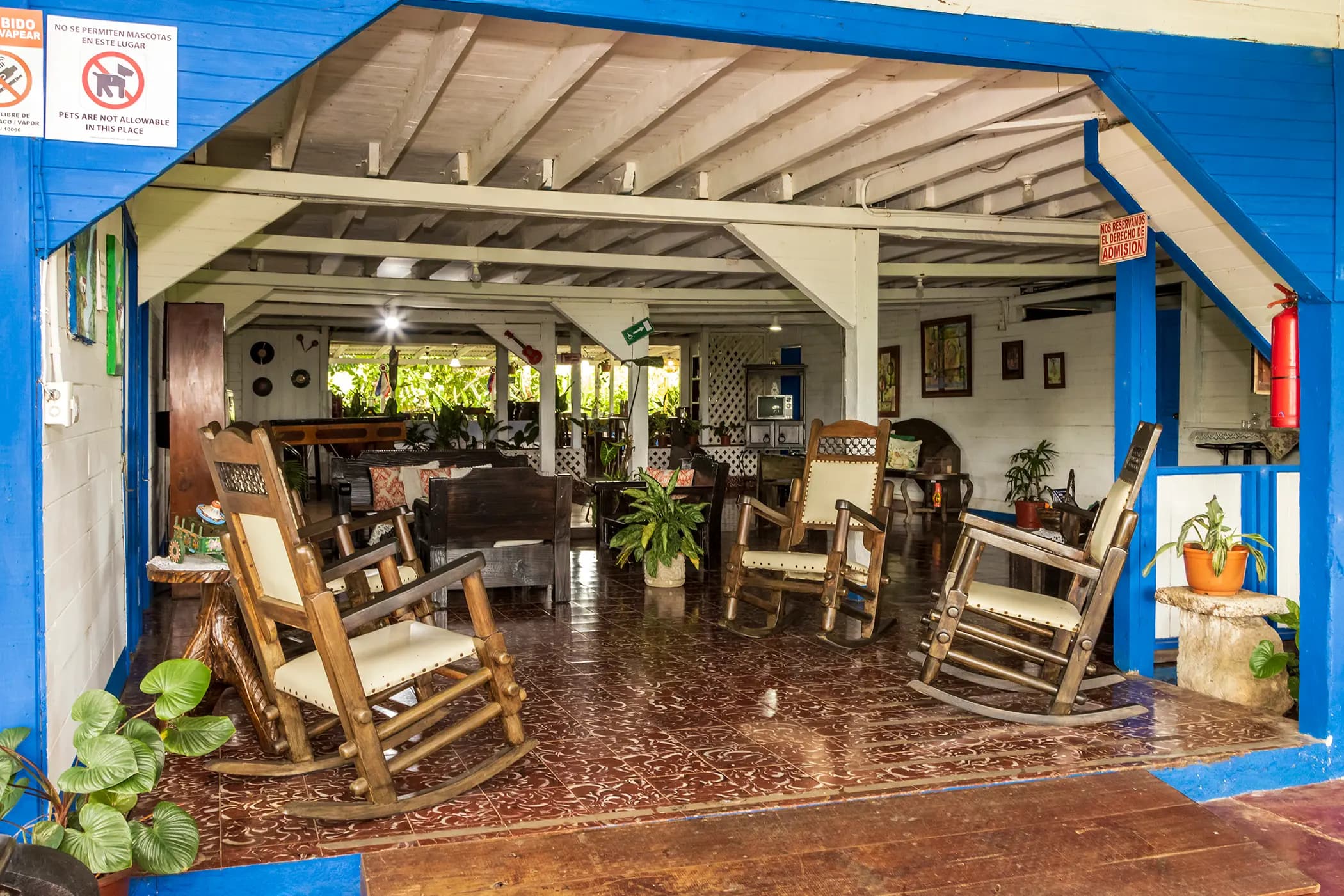 Farmhouse porch with traditional rocking chairs