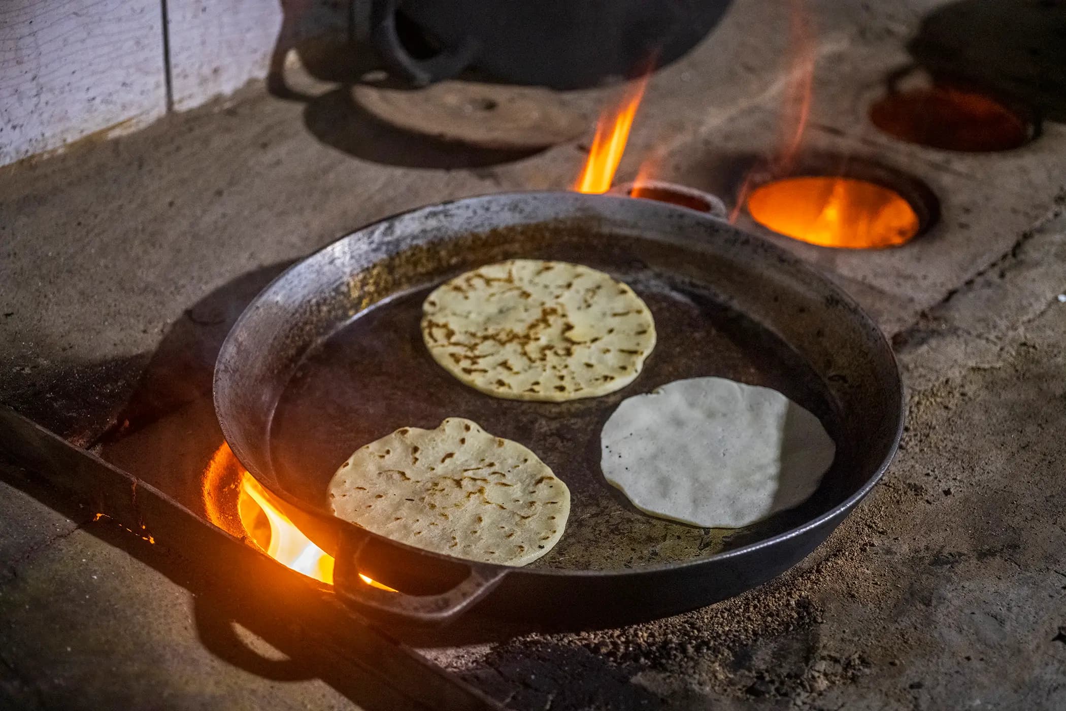 Traditional pots on wood-fired stove