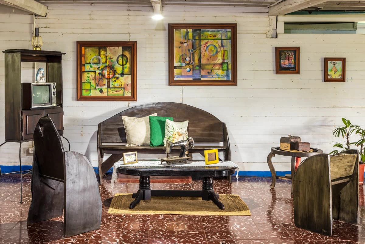 Historic interior living room with antique sewing machine and vintage furniture